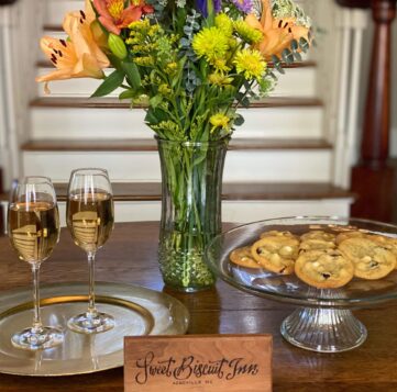 cookies and champagne to welcome guests to sweet biscuit inn